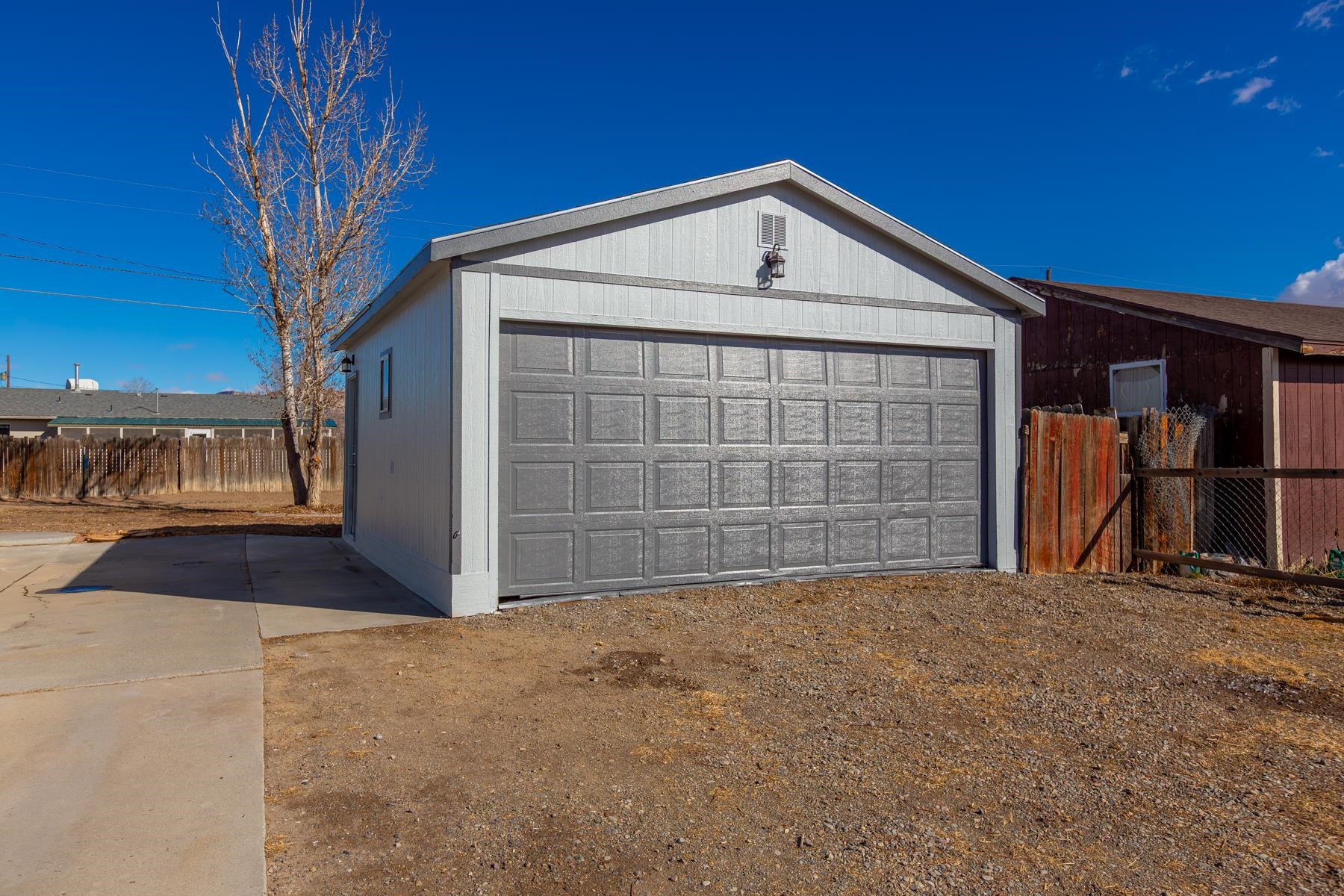 3212 D D 1/4 Road Clifton, CO 81520 - Photo 25 of 25 a front view of a house with a yard