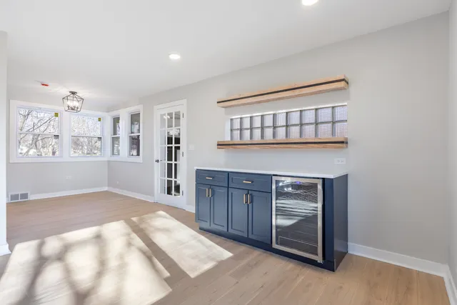 a kitchen with a cabinets and window
