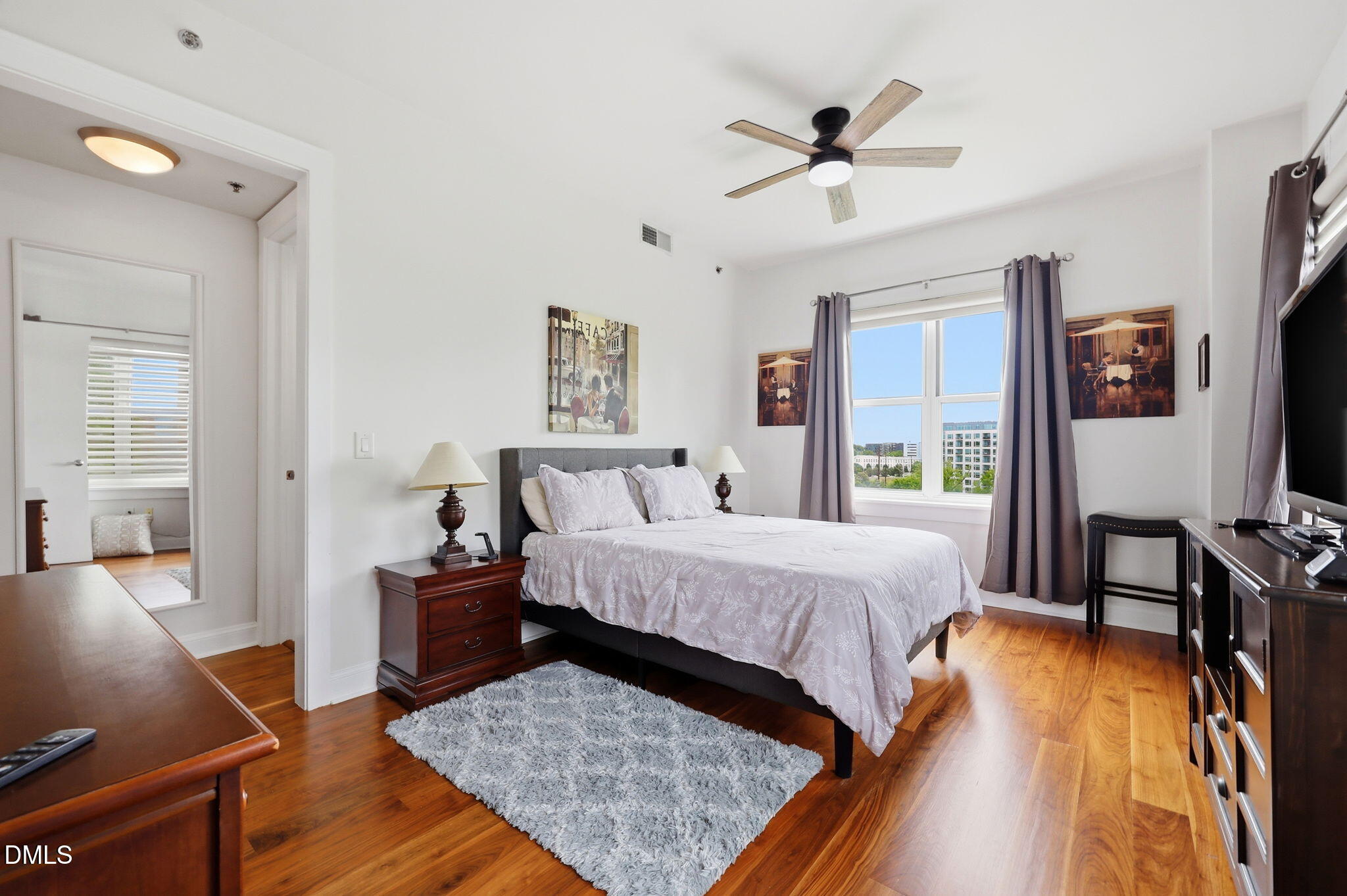 618 North Boylan Avenue, Unit 718 Raleigh, NC 27603 - Photo 11 of 38 a bed room with a bed and a couch