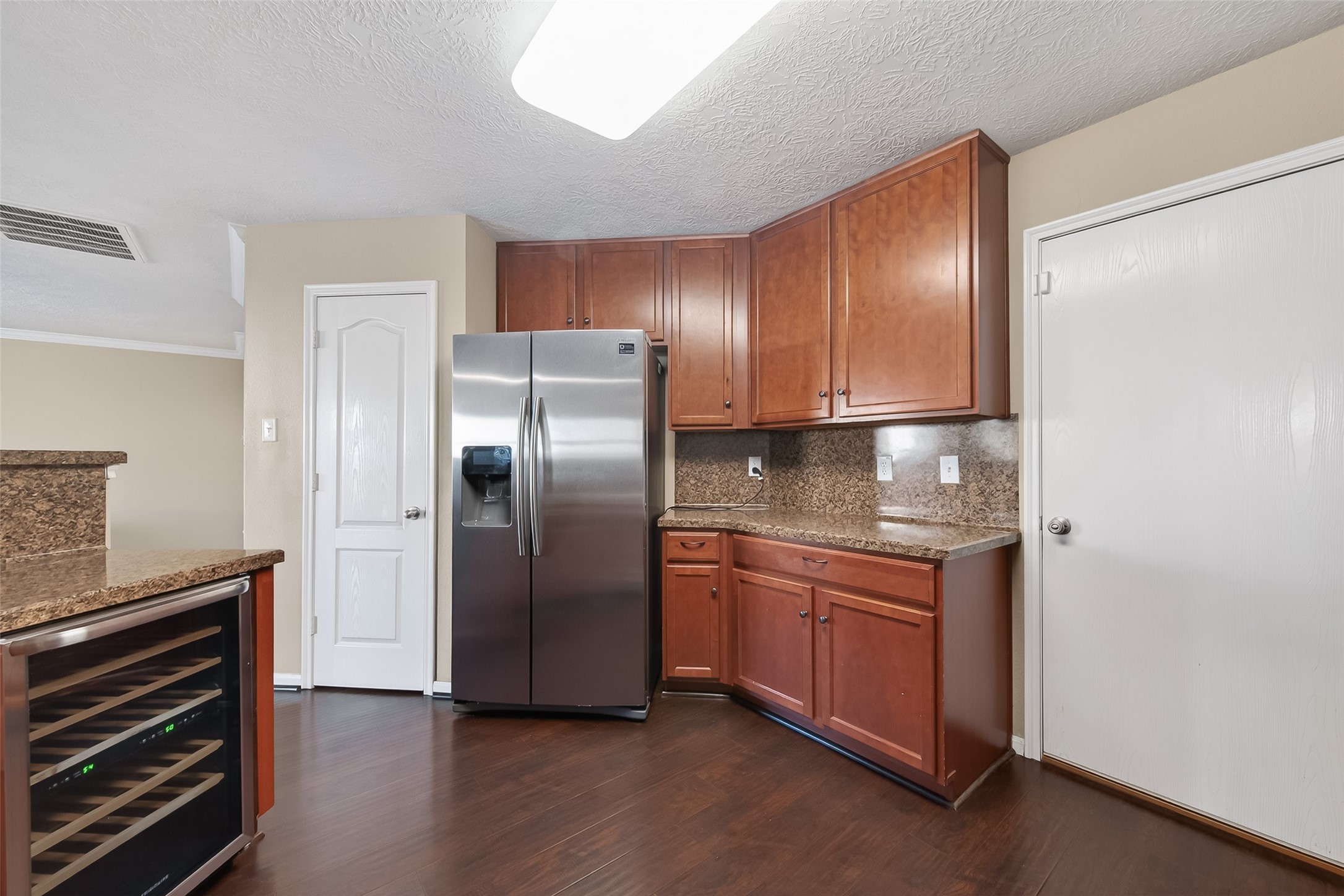 18110 Rexine Lane Cypress, TX 77433 - Photo 18 of 50 a kitchen with stainless steel appliances granite countertop a refrigerator and a sink