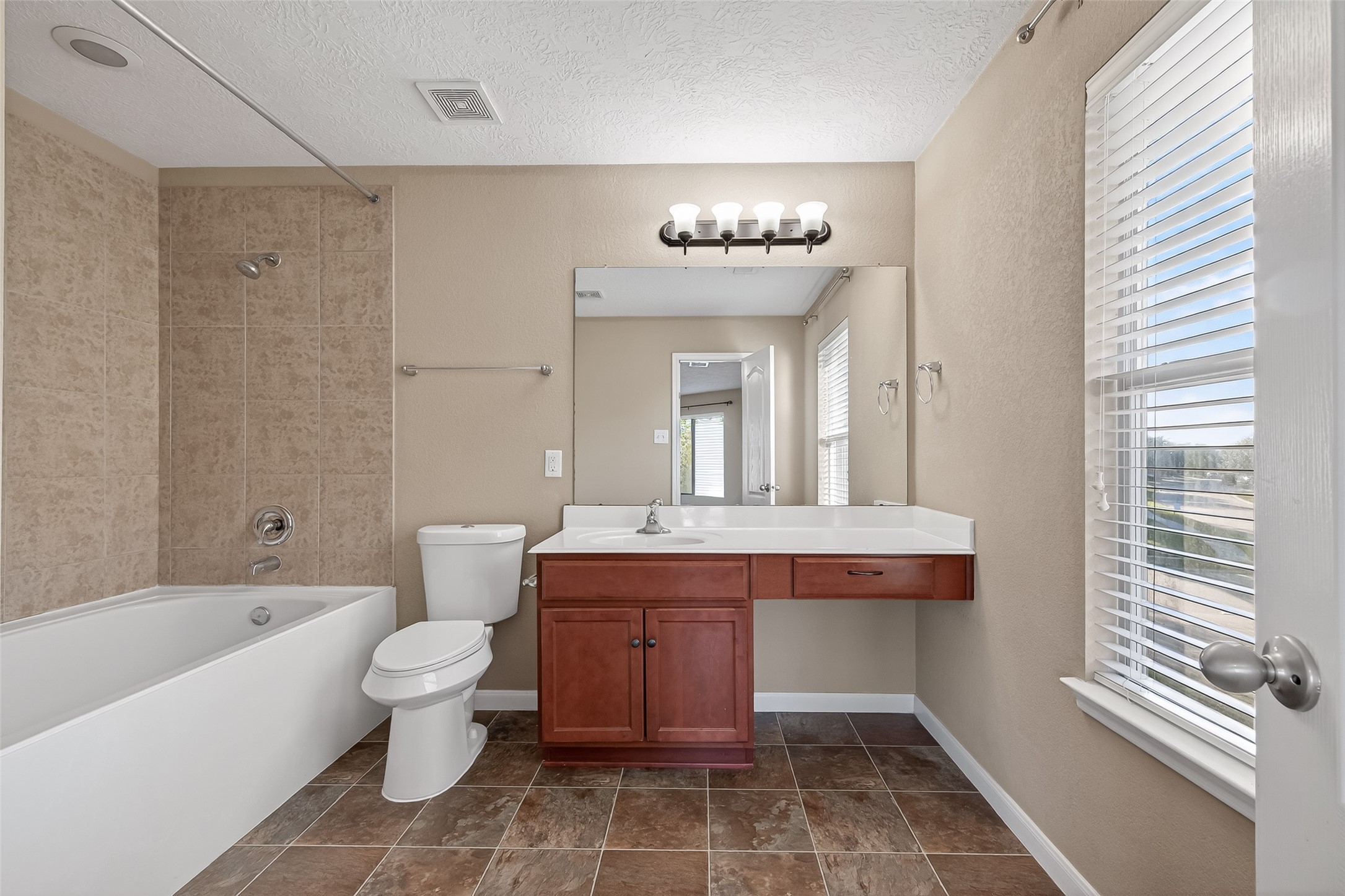 18110 Rexine Lane Cypress, TX 77433 - Photo 28 of 50 a spacious bathroom with a bathtub sink and toilet