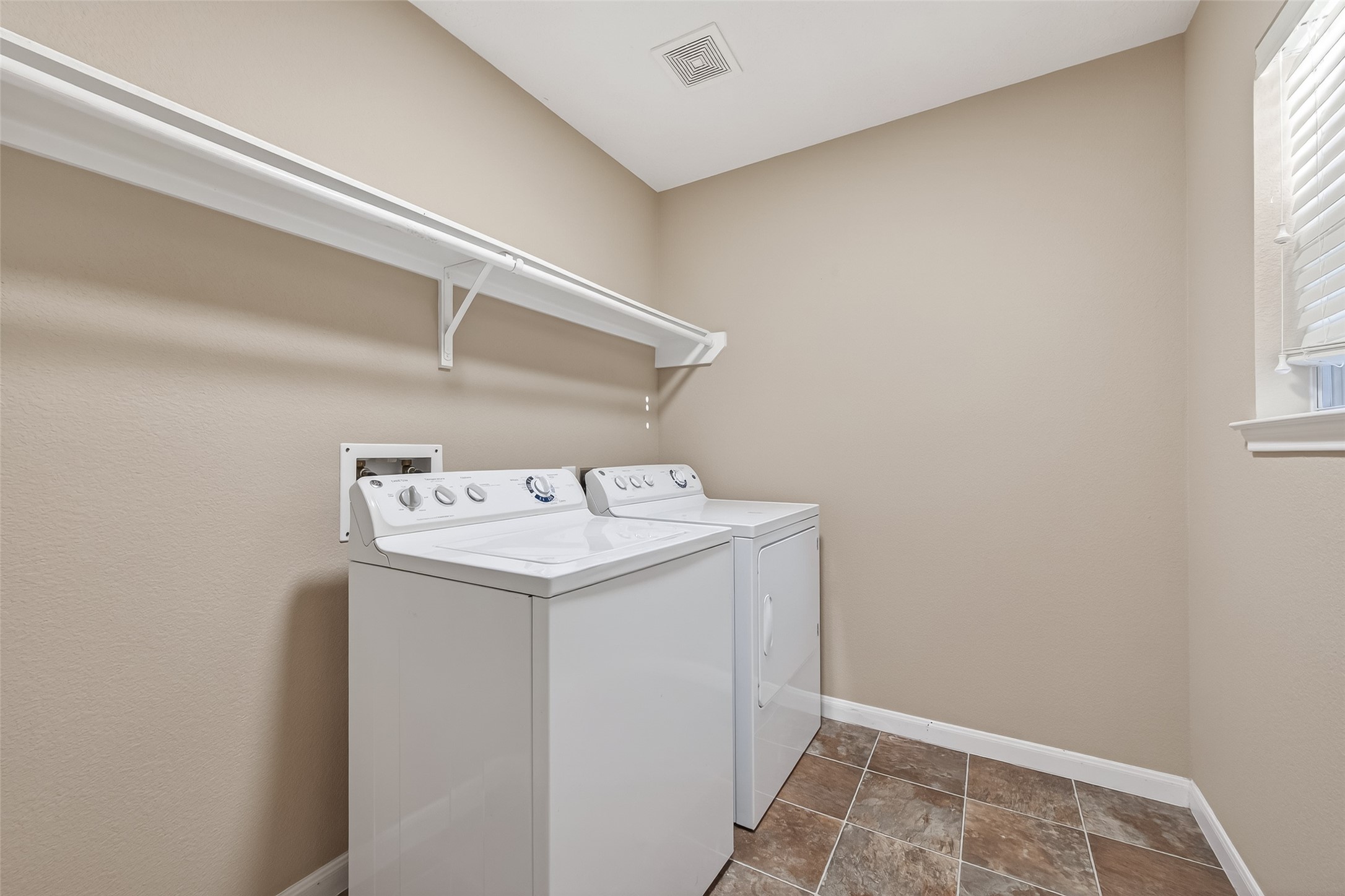 18110 Rexine Lane Cypress, TX 77433 - Photo 30 of 50 a utility room with dryer and washer