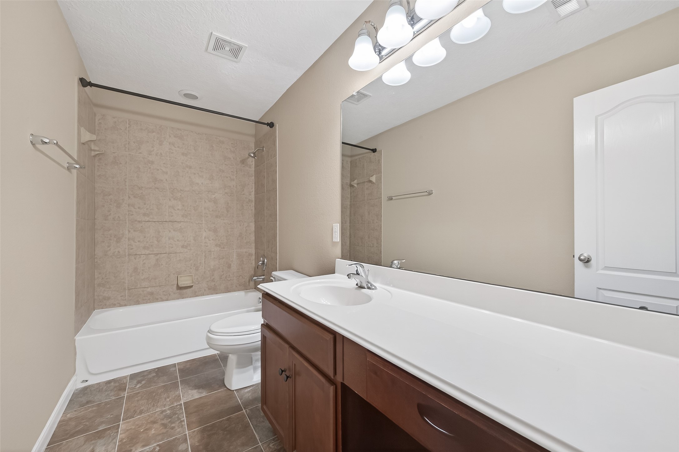 18110 Rexine Lane Cypress, TX 77433 - Photo 37 of 50 a bathroom with a sink a toilet a mirror and shower