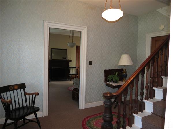 301 Boston Road Sutton, MA 01590 - Photo 15 of 30 a view of entryway with wooden floor and stairs