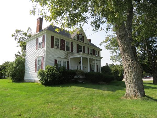 301 Boston Road Sutton, MA 01590 - Photo 2 of 30 a front view of a house with garden
