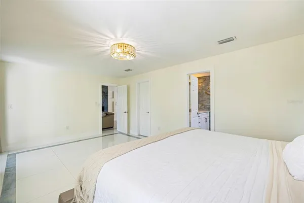 a kitchen with stainless steel appliances granite countertop a refrigerator and microwave