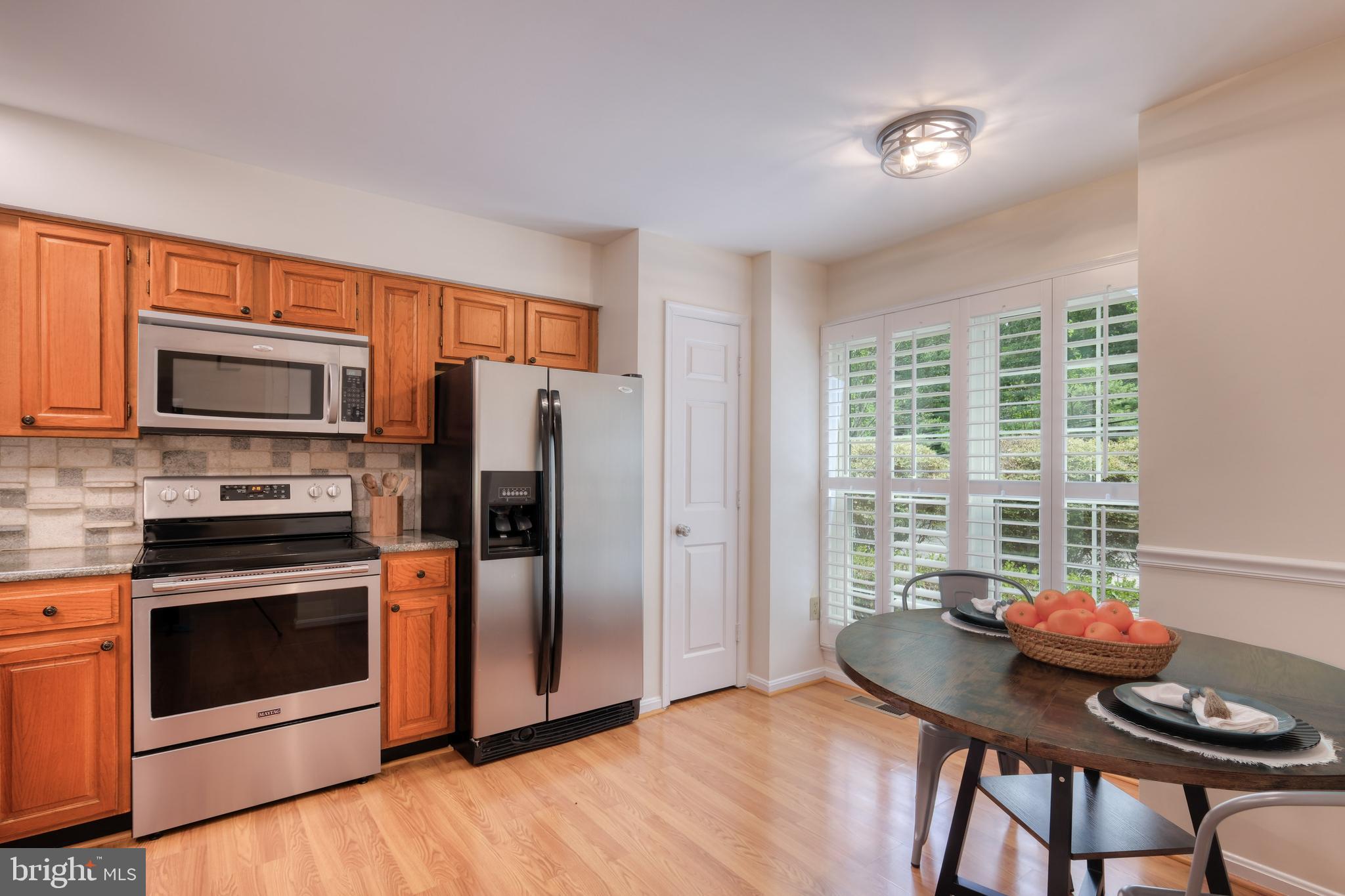 8174 Cliffview Avenue Springfield, VA 22153 - Photo 11 of 55 Breakfast area and a pantry in kitchen