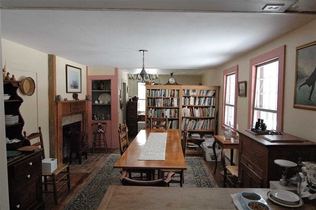 118 Falls Road Royalston, MA 01368 - Photo 8 of 13 a room with lots of wooden furniture and windows