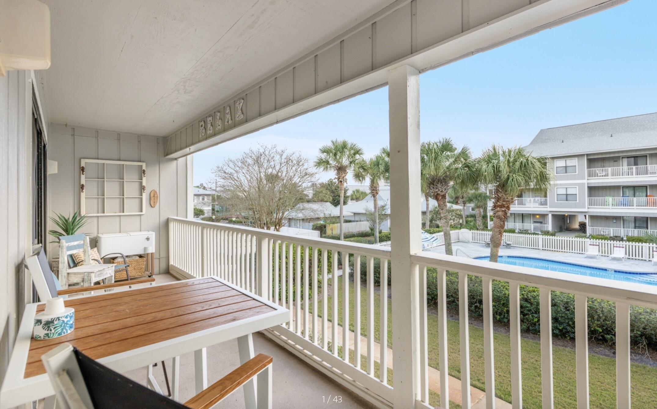 3799 East County Highway 30A, Unit E12 Santa Rosa Beach, FL 32459 - Photo 2 of 34 a view of a two chair in the balcony