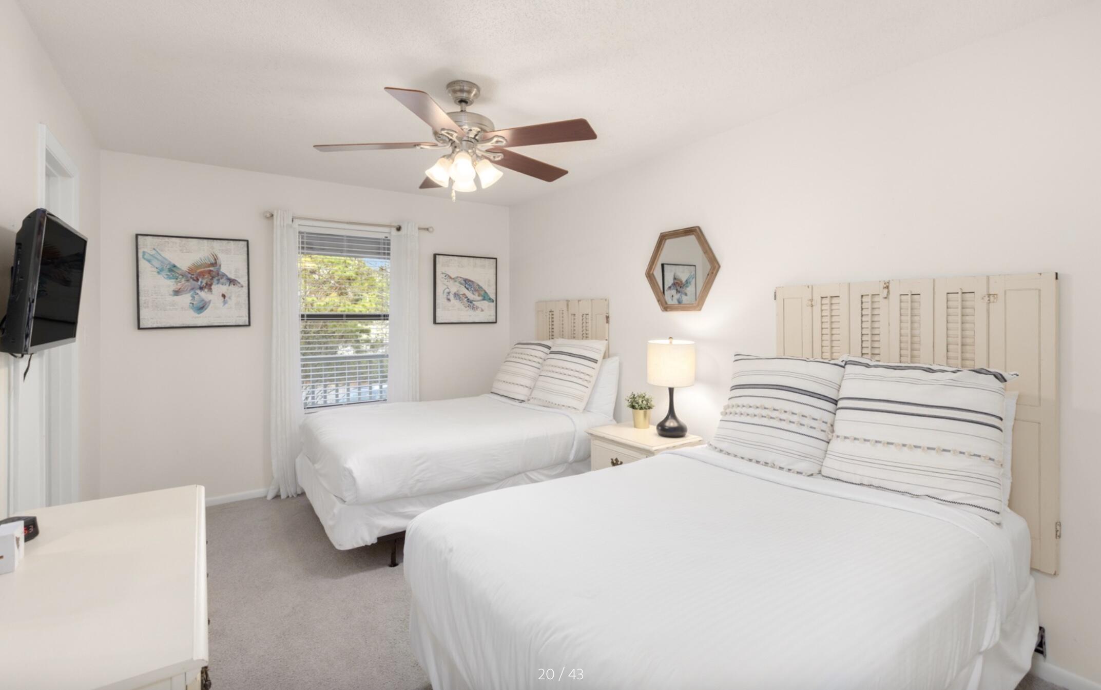3799 East County Highway 30A, Unit E12 Santa Rosa Beach, FL 32459 - Photo 22 of 34 a bedroom with 2 bed and a window