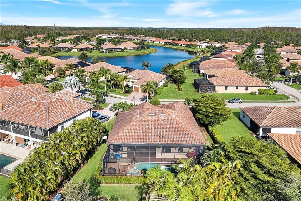 11050 Longwing Drive Fort Myers, FL 33912 - Photo 15 of 43 Aerial perspective of suburban area featuring a large body of water