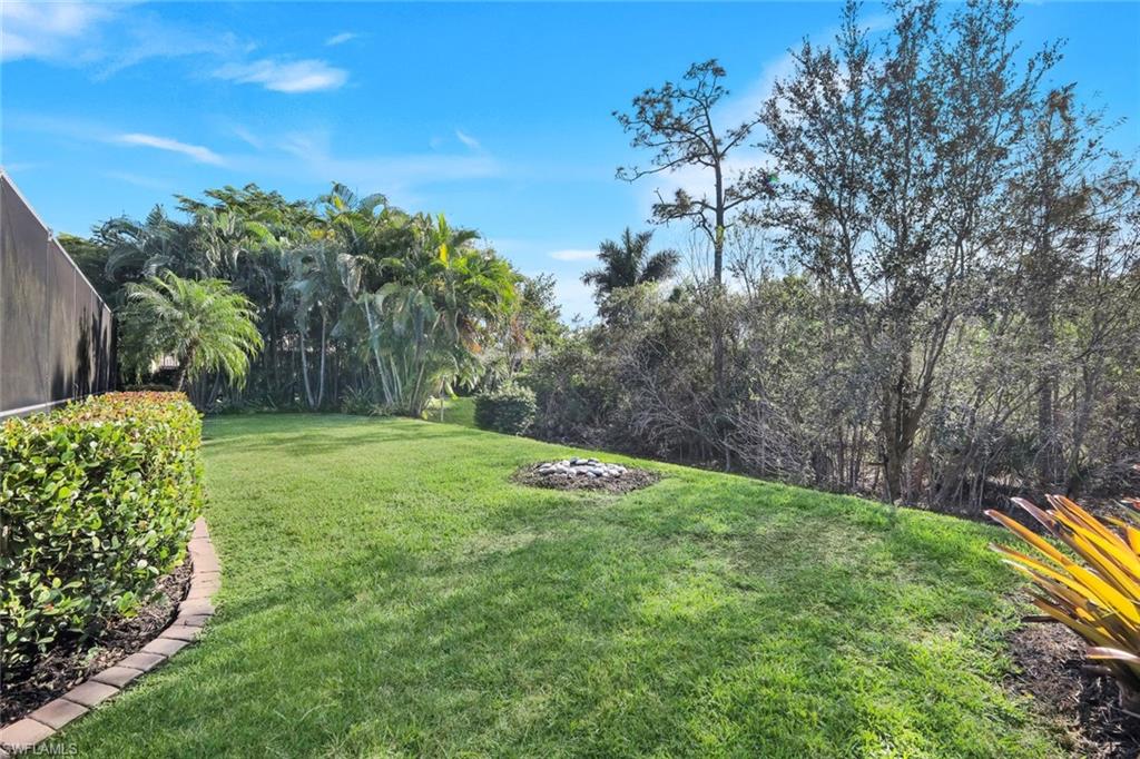 11050 Longwing Drive Fort Myers, FL 33912 - Photo 29 of 43 View of green lawn