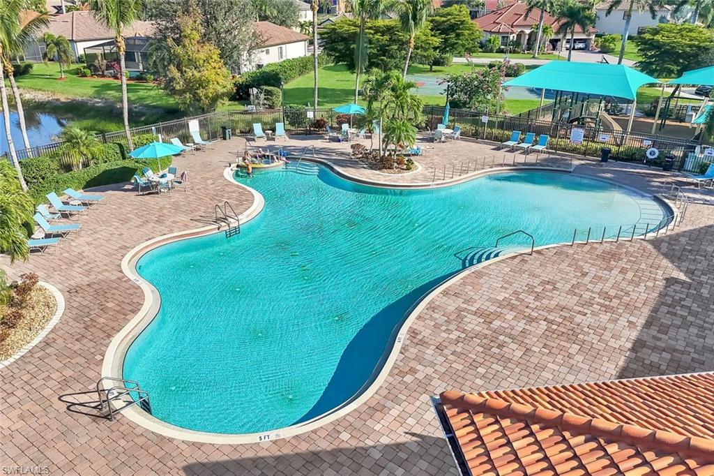 11050 Longwing Drive Fort Myers, FL 33912 - Photo 32 of 43 Community pool with a patio