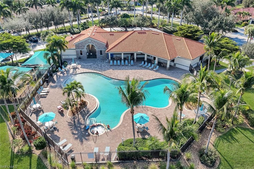 11050 Longwing Drive Fort Myers, FL 33912 - Photo 35 of 43 Community pool featuring a patio area