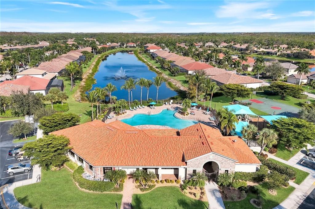 11050 Longwing Drive Fort Myers, FL 33912 - Photo 38 of 43 Aerial view of residential area featuring a nearby body of water and a pool