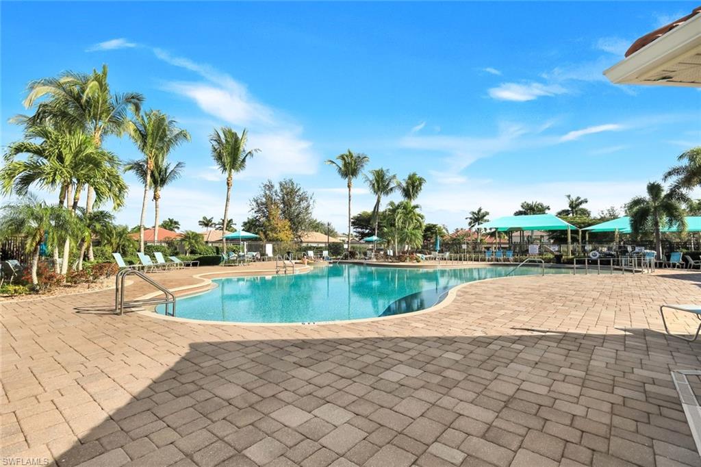 11050 Longwing Drive Fort Myers, FL 33912 - Photo 42 of 43 Community pool with a patio
