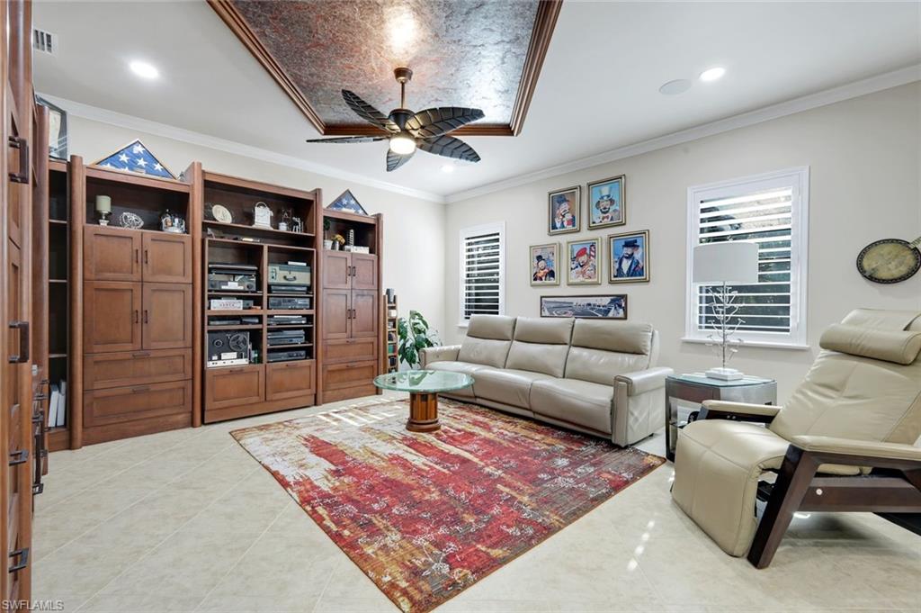 11050 Longwing Drive Fort Myers, FL 33912 - Photo 5 of 43 Living room featuring a ceiling fan, light tile patterned floors, recessed lighting, and ornamental molding