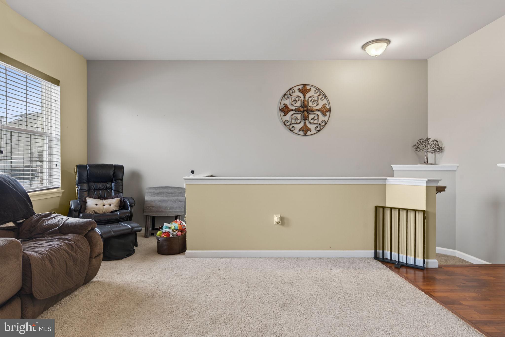 2436 Schultz Way, Unit 19 York, PA 17402 - Photo 13 of 30 a view of a livingroom with furniture and a window