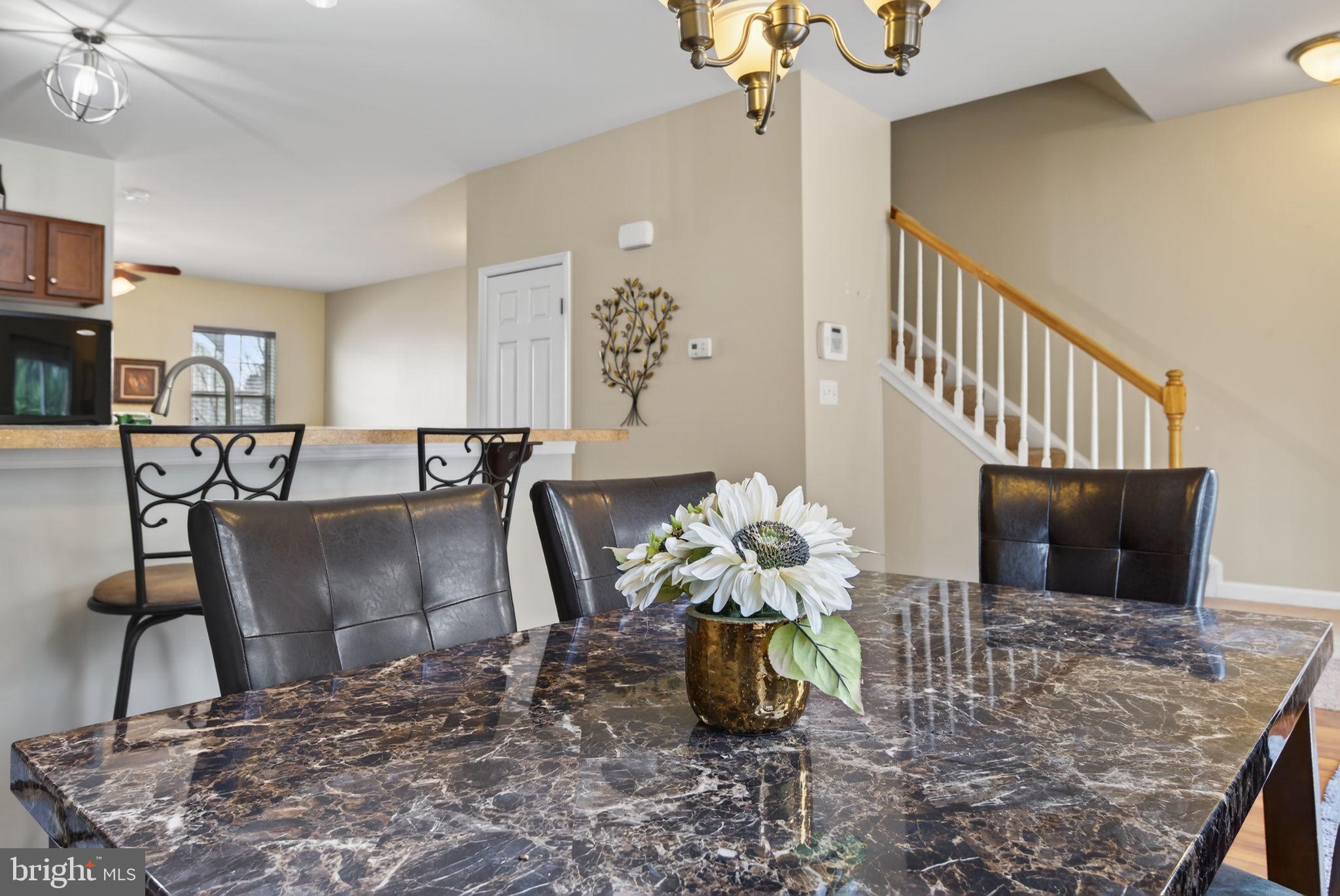 2436 Schultz Way, Unit 19 York, PA 17402 - Photo 14 of 30 a view of a dining room with furniture