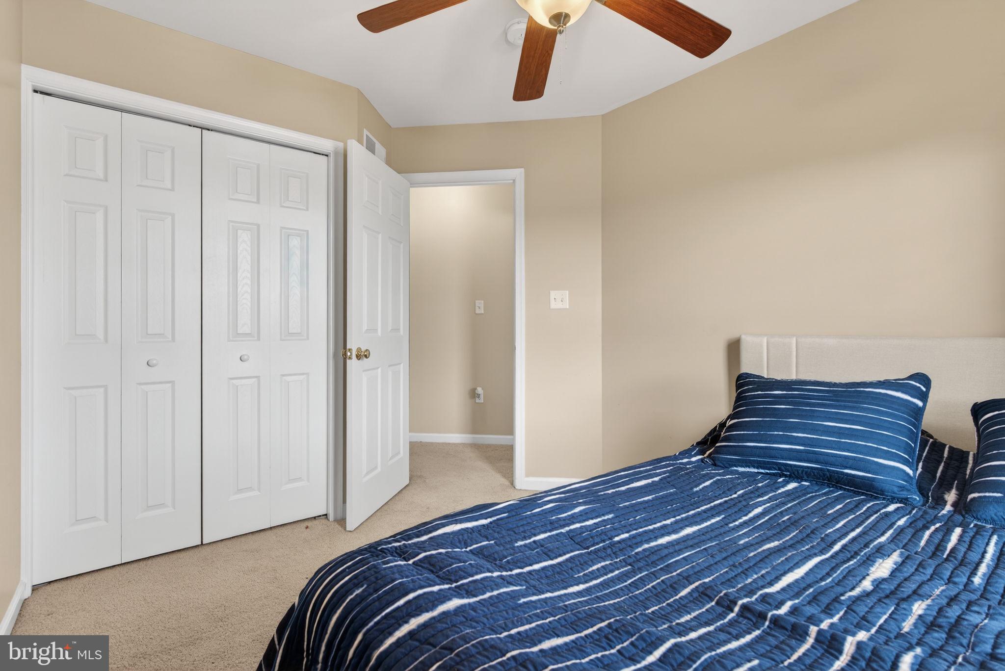 2436 Schultz Way, Unit 19 York, PA 17402 - Photo 22 of 30 a bedroom with a bed and a window