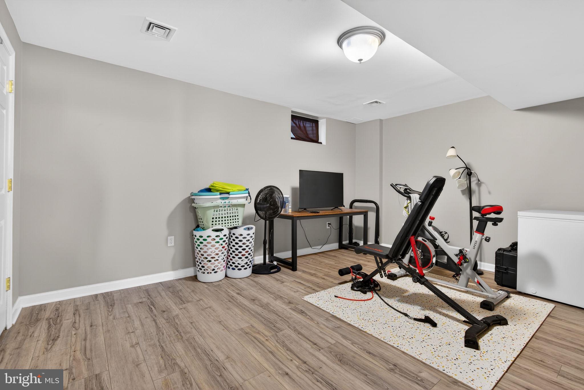 2436 Schultz Way, Unit 19 York, PA 17402 - Photo 27 of 30 a view of a room with gym equipment