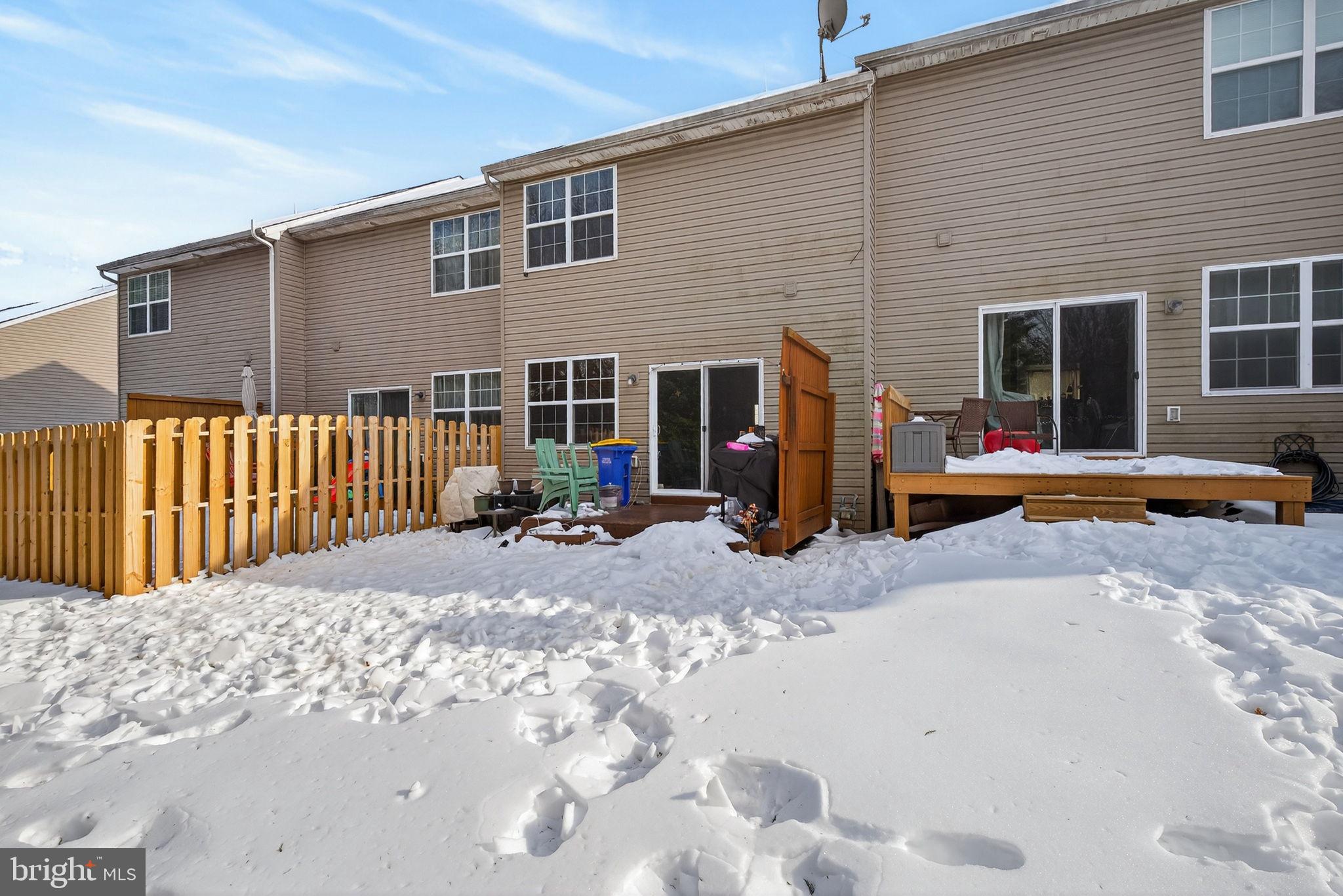 2436 Schultz Way, Unit 19 York, PA 17402 - Photo 29 of 30 a backyard of a house with yard and seating space