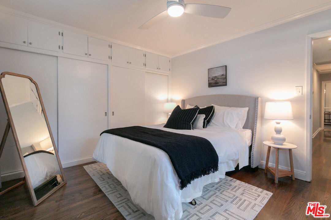 2415 8th Avenue Los Angeles, CA 90018 - Photo 28 of 55 a bedroom with bed and a window