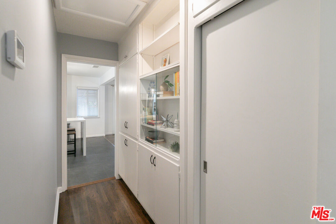 2415 8th Avenue Los Angeles, CA 90018 - Photo 40 of 55 a kitchen with a refrigerator and white cabinets