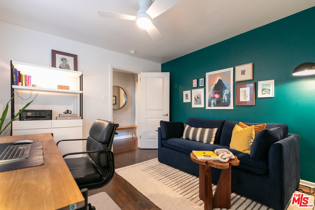 2415 8th Avenue Los Angeles, CA 90018 - Photo 46 of 55 a living room with furniture