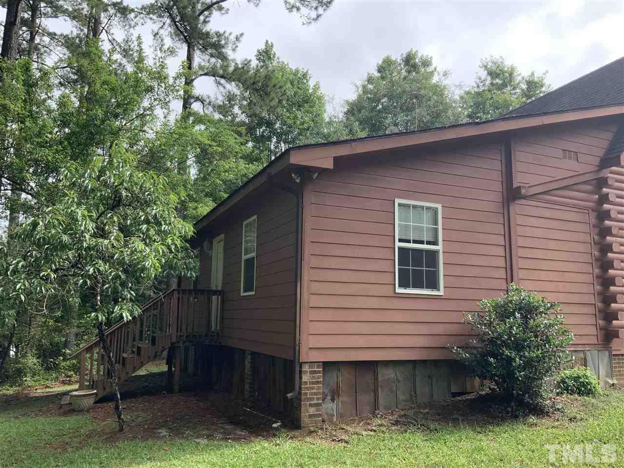 4 Dawn Road Benson, NC 27504 - Photo 2 of 19 a view of a house with a yard