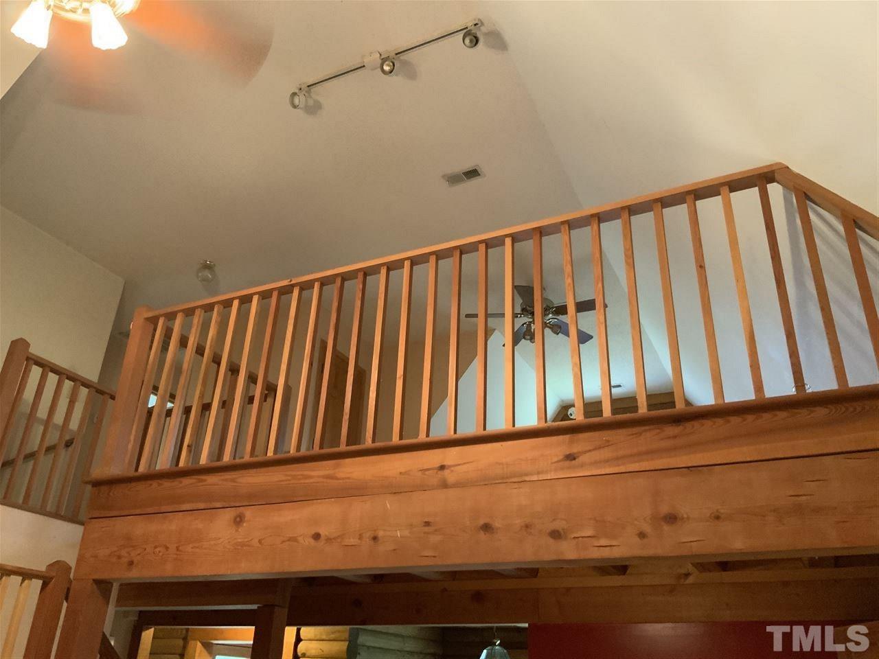 4 Dawn Road Benson, NC 27504 - Photo 11 of 19 a view of staircase with railing and a window