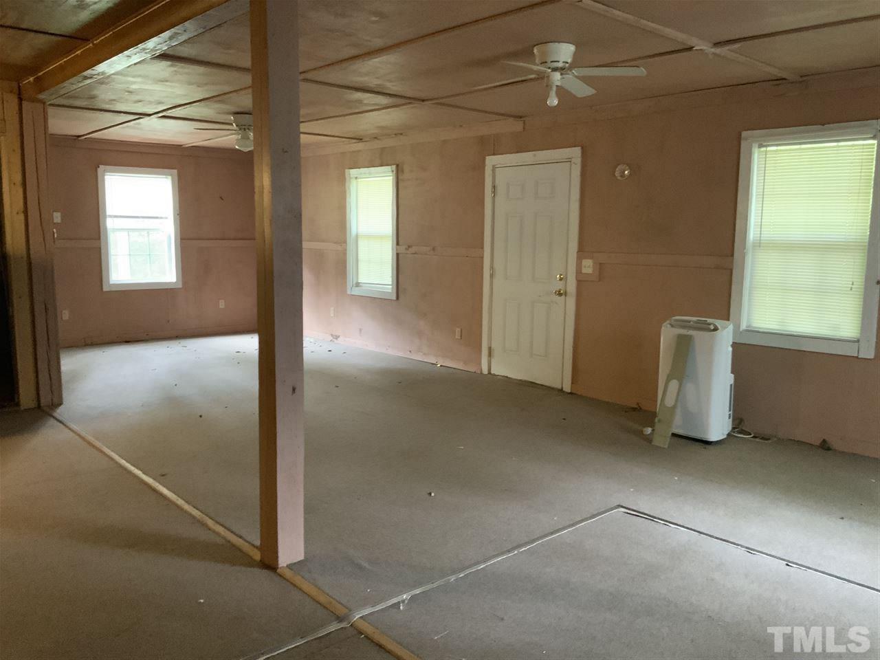 4 Dawn Road Benson, NC 27504 - Photo 9 of 19 a view of an empty room with a bathroom