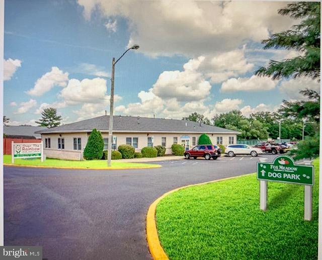 100 Fox Meadow Drive Maple Shade, NJ 08052 - Photo 8 of 12 a front view of a house with a yard and table and chairs