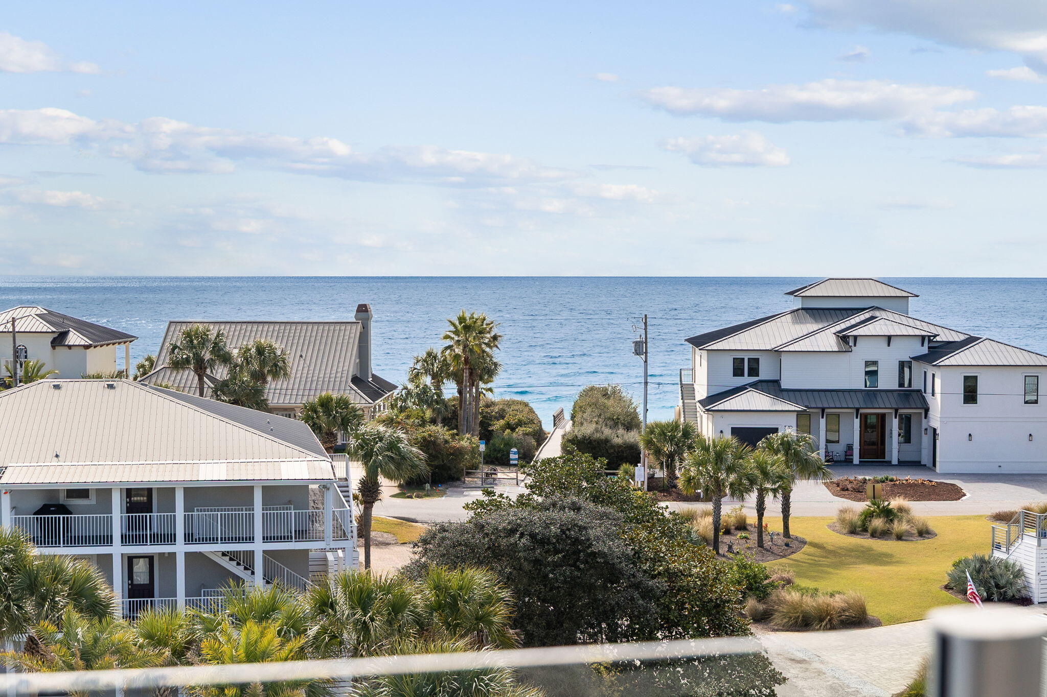 230 Blue Lake Road Santa Rosa Beach, FL 32459 - Photo 18 of 110 a front view of a house with garden