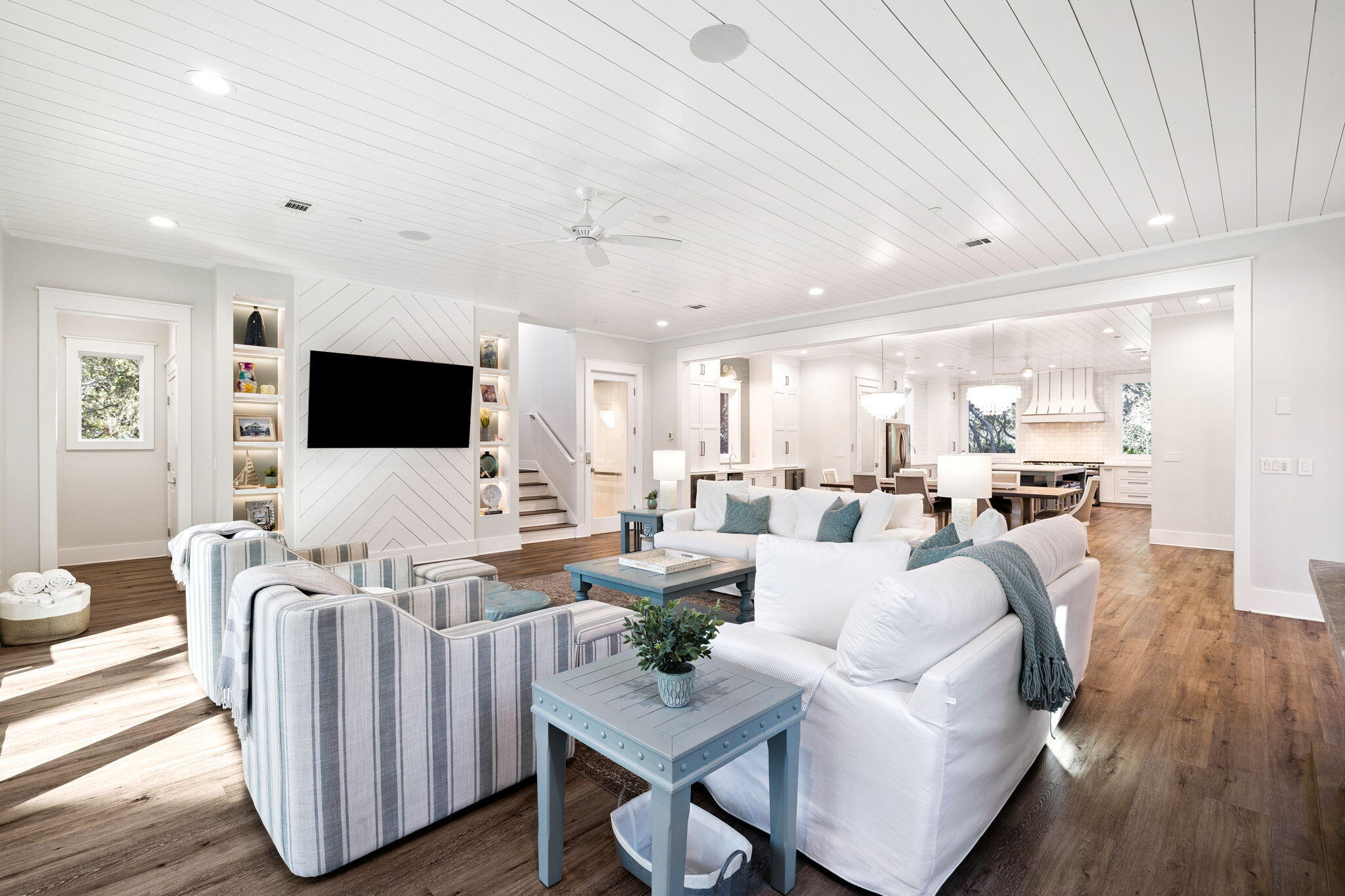 230 Blue Lake Road Santa Rosa Beach, FL 32459 - Photo 25 of 110 a living room with furniture flat screen tv and wooden floor