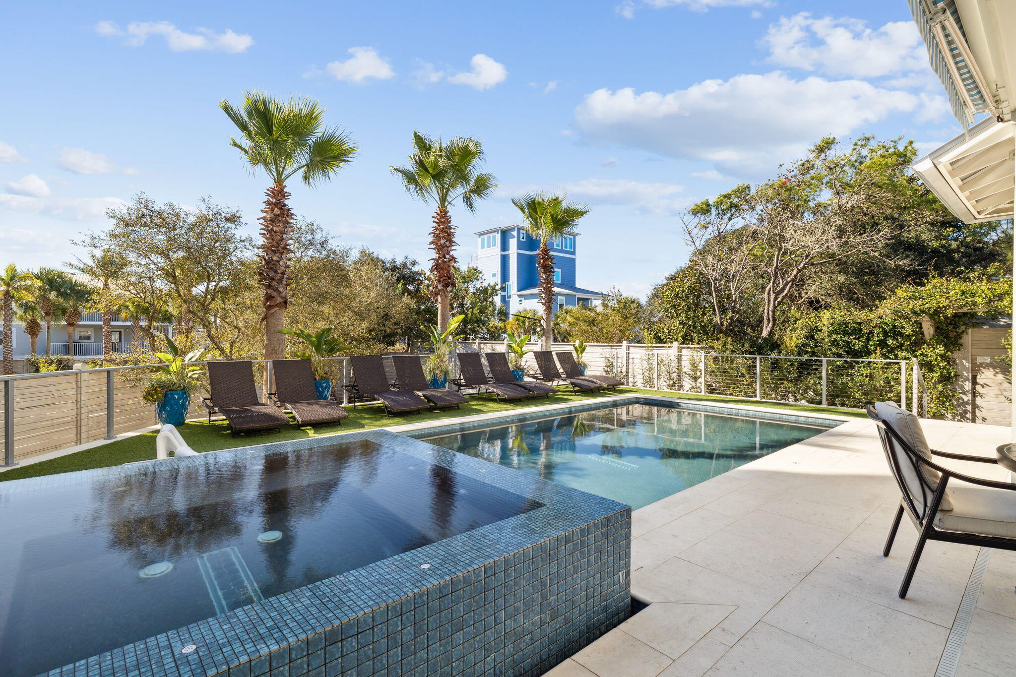230 Blue Lake Road Santa Rosa Beach, FL 32459 - Photo 43 of 110 a view of a swimming pool with a patio