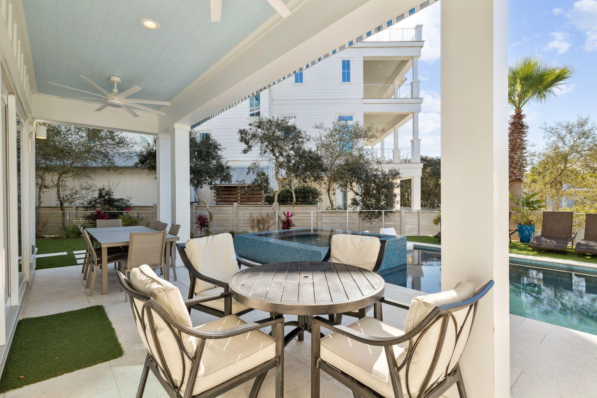 230 Blue Lake Road Santa Rosa Beach, FL 32459 - Photo 47 of 110 a dining room with furniture and wooden floor