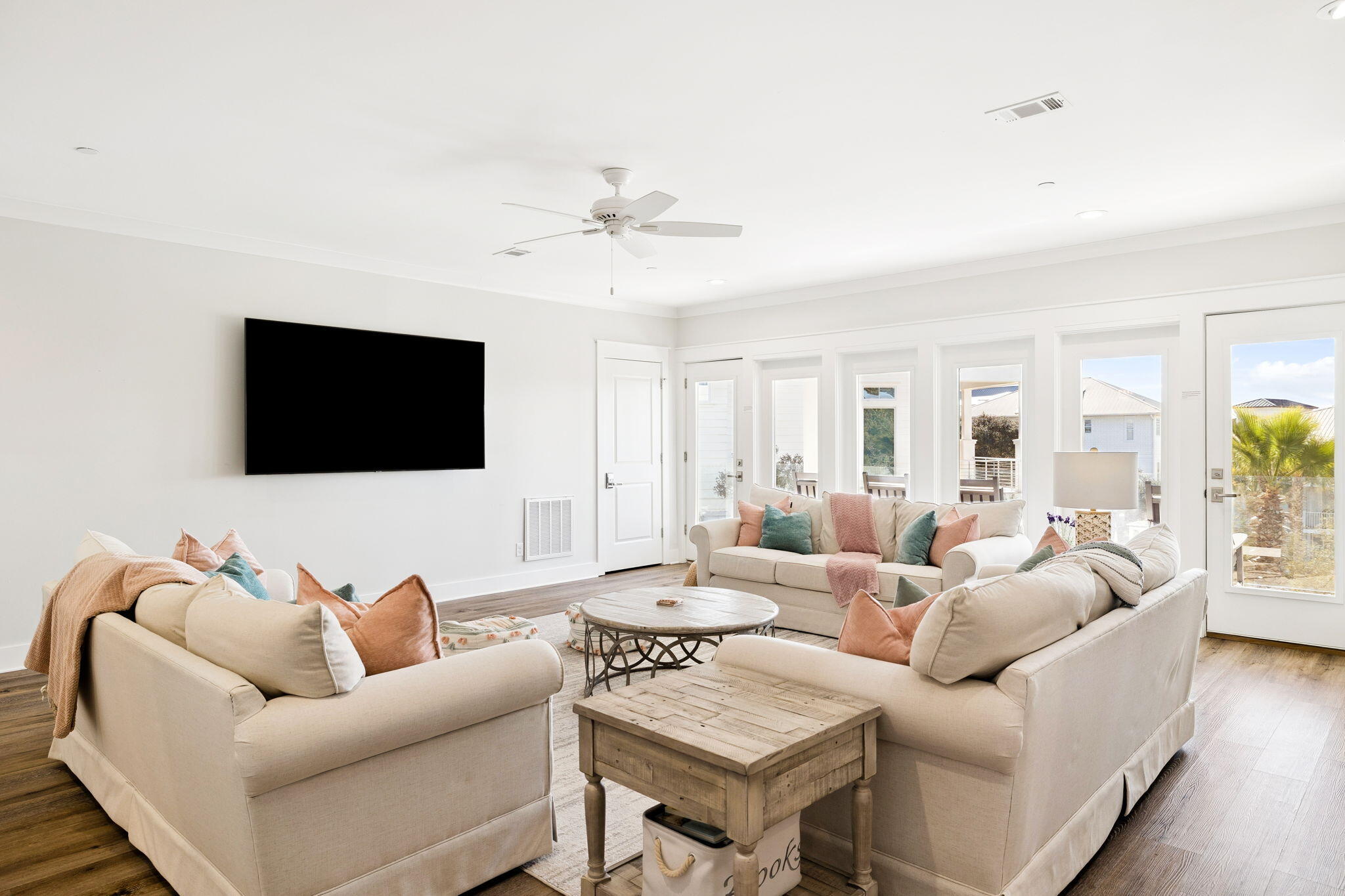 230 Blue Lake Road Santa Rosa Beach, FL 32459 - Photo 55 of 110 a living room with furniture and a flat screen tv