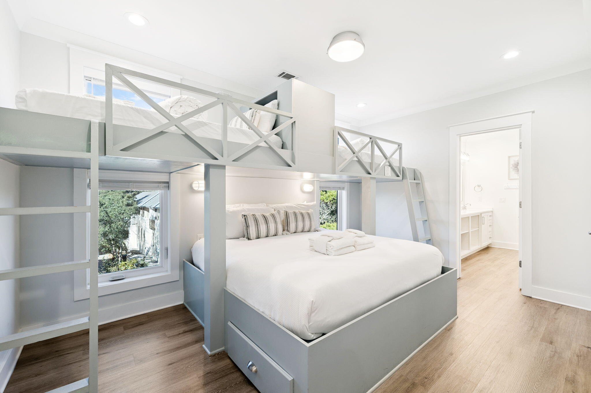 230 Blue Lake Road Santa Rosa Beach, FL 32459 - Photo 77 of 110 a bedroom with a bed and a window