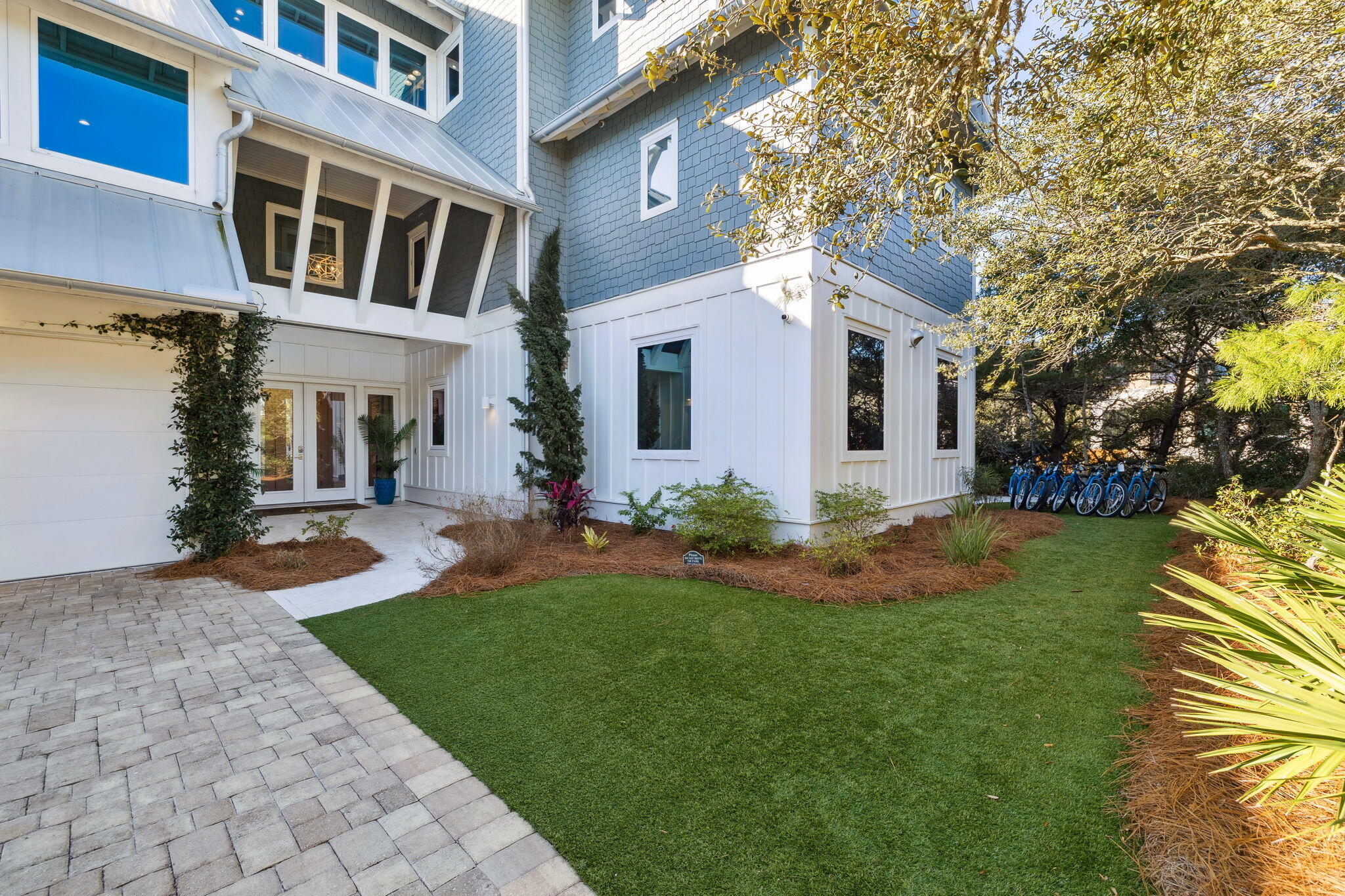 230 Blue Lake Road Santa Rosa Beach, FL 32459 - Photo 9 of 110 a front view of a house with a yard
