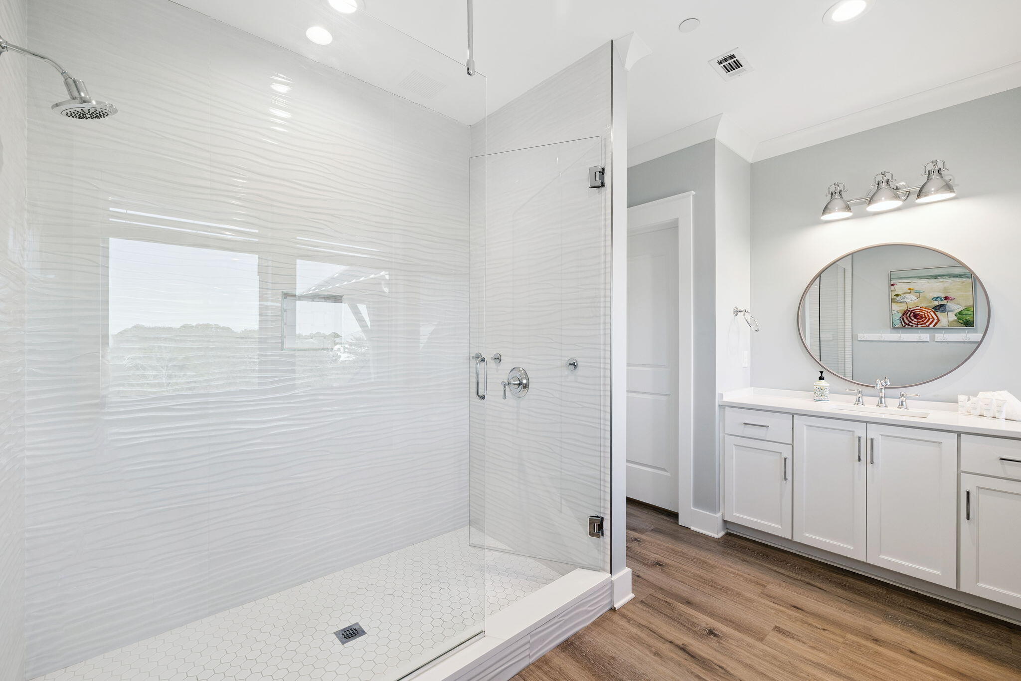 230 Blue Lake Road Santa Rosa Beach, FL 32459 - Photo 92 of 110 a bathroom with a granite countertop sink a mirror and shower