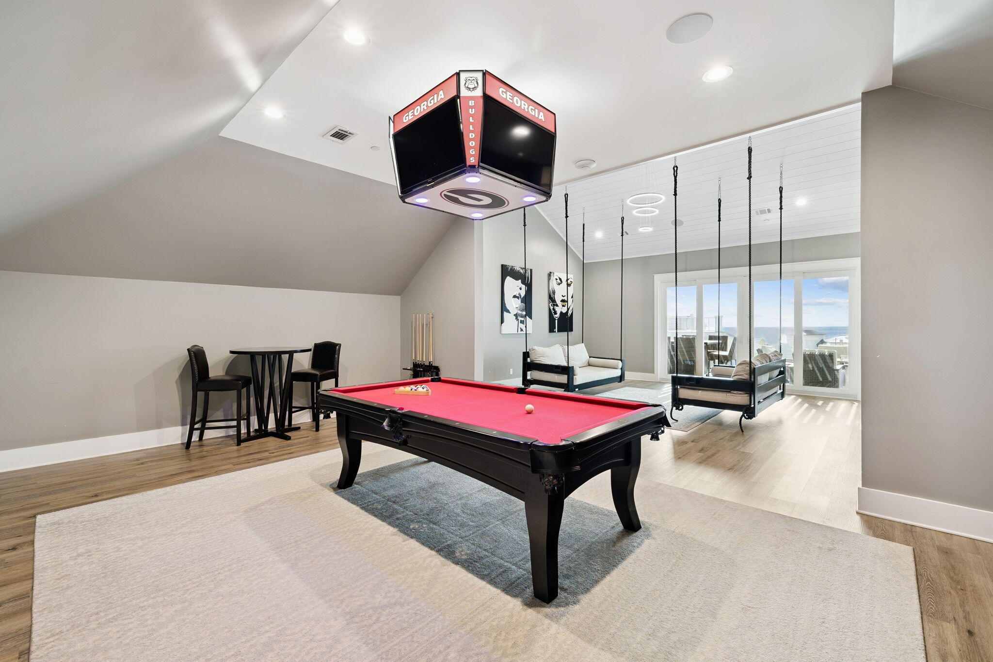 230 Blue Lake Road Santa Rosa Beach, FL 32459 - Photo 96 of 110 a living room with furniture a pool table and a large window with garden view