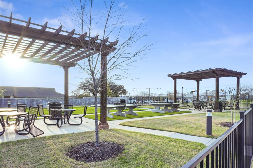 630 Blue Rdg Drive Mansfield, TX 76063 - Photo 23 of 27 a view of a swimming pool with a patio and a yard