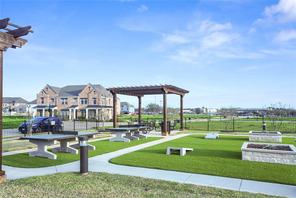 630 Blue Rdg Drive Mansfield, TX 76063 - Photo 24 of 27 a view of a big yard with a swimming pool