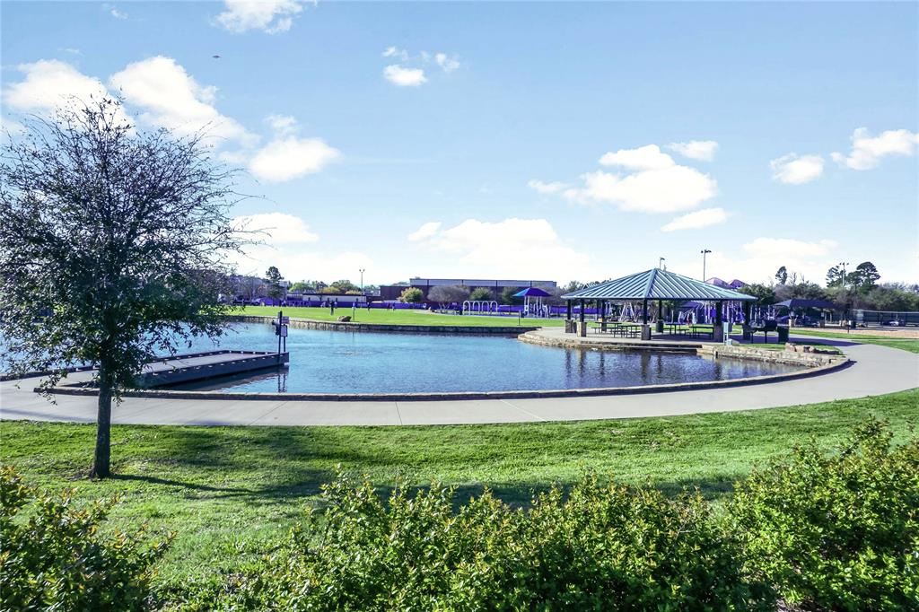 630 Blue Rdg Drive Mansfield, TX 76063 - Photo 25 of 27 a view of a lake with houses in the back
