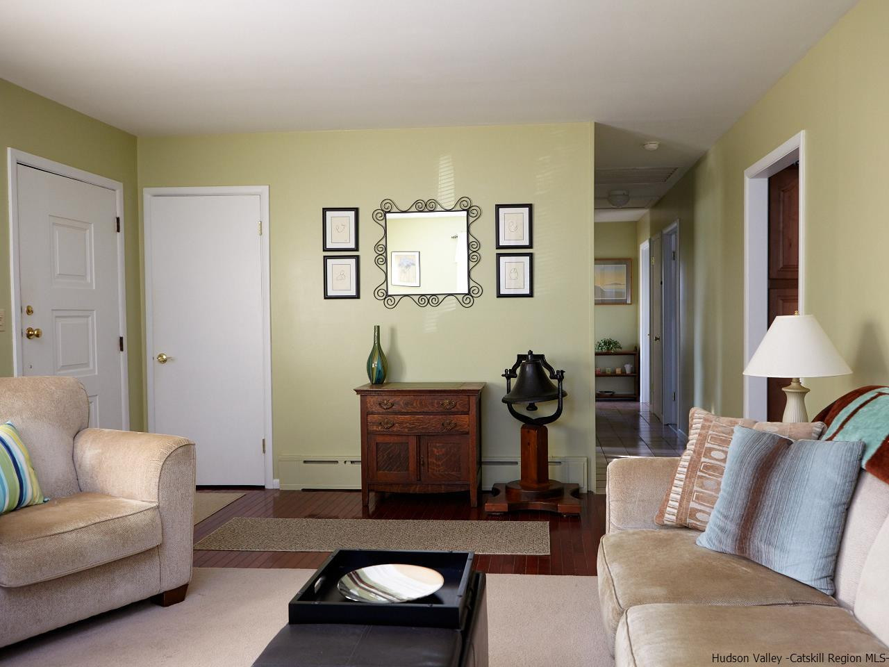 104 South Riverside Road Highland, NY 12528 - Photo 4 of 28 a living room with furniture and a lamp