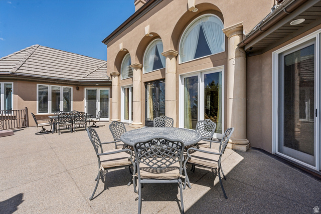 1714 Ridge Point Drive Bountiful, UT 84010 - Photo 109 of 132 Expansive outdoor patio with a textured concrete surface