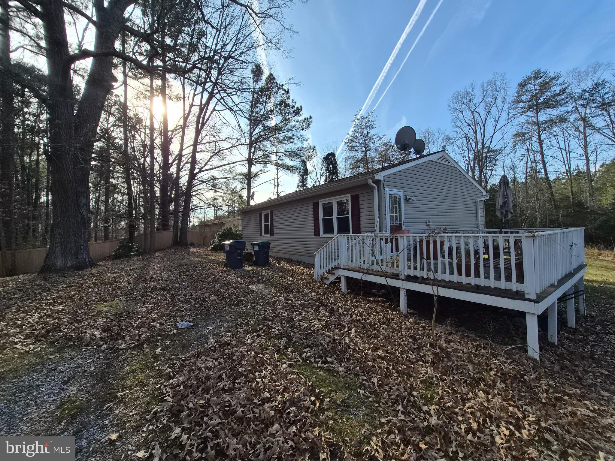 6401 Towles Mill Road Spotsylvania, VA 22551 - Photo 15 of 19 a view of a house with a yard and deck