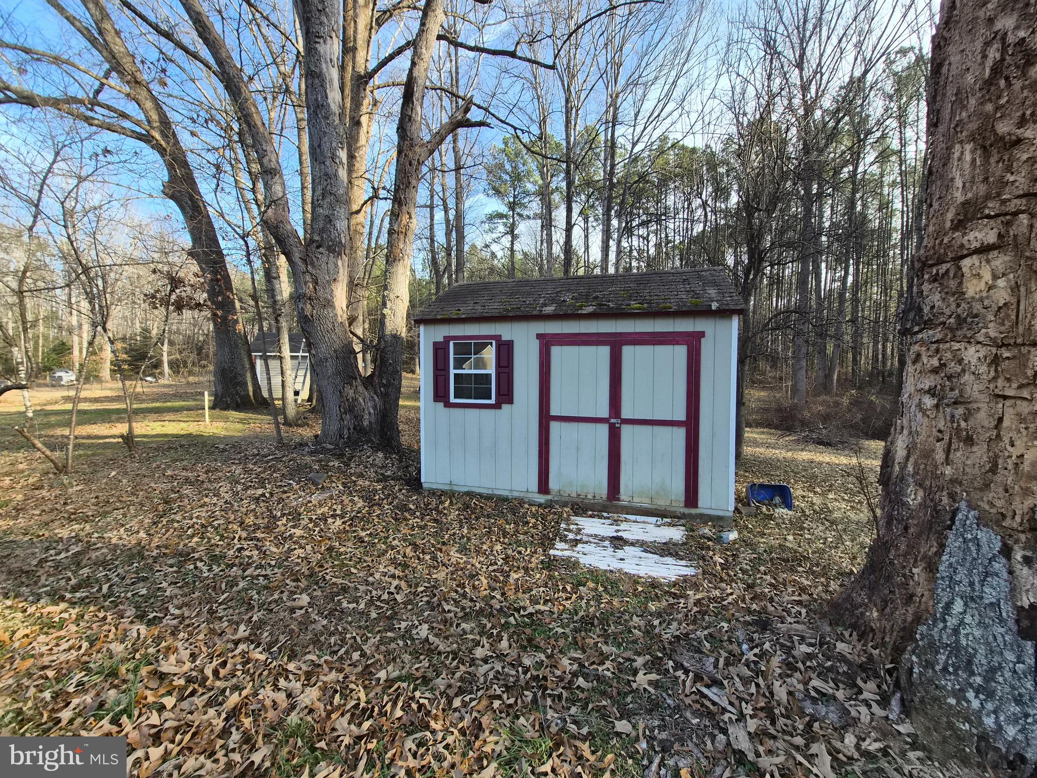 6401 Towles Mill Road Spotsylvania, VA 22551 - Photo 17 of 19 a front view of house with a garden