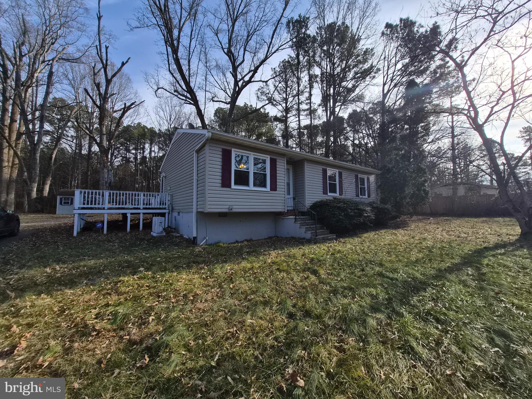 6401 Towles Mill Road Spotsylvania, VA 22551 - Photo 2 of 19 a front view of a house with garden